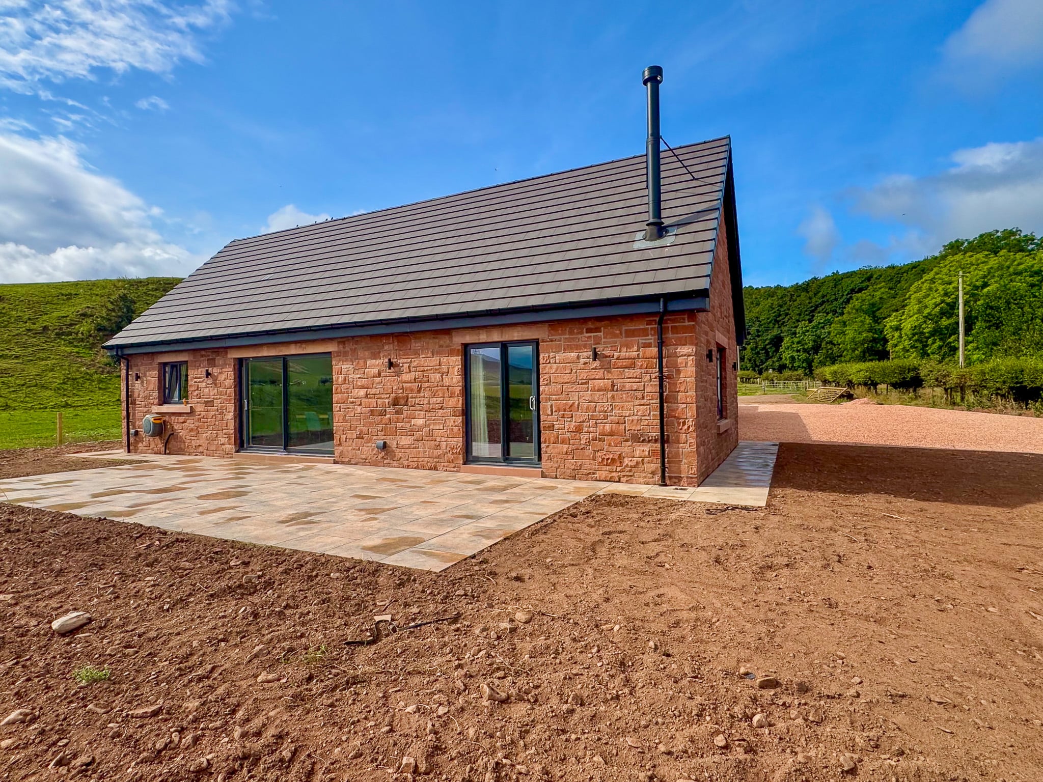 Completed sandstone home and patio photographed for C&G Developments