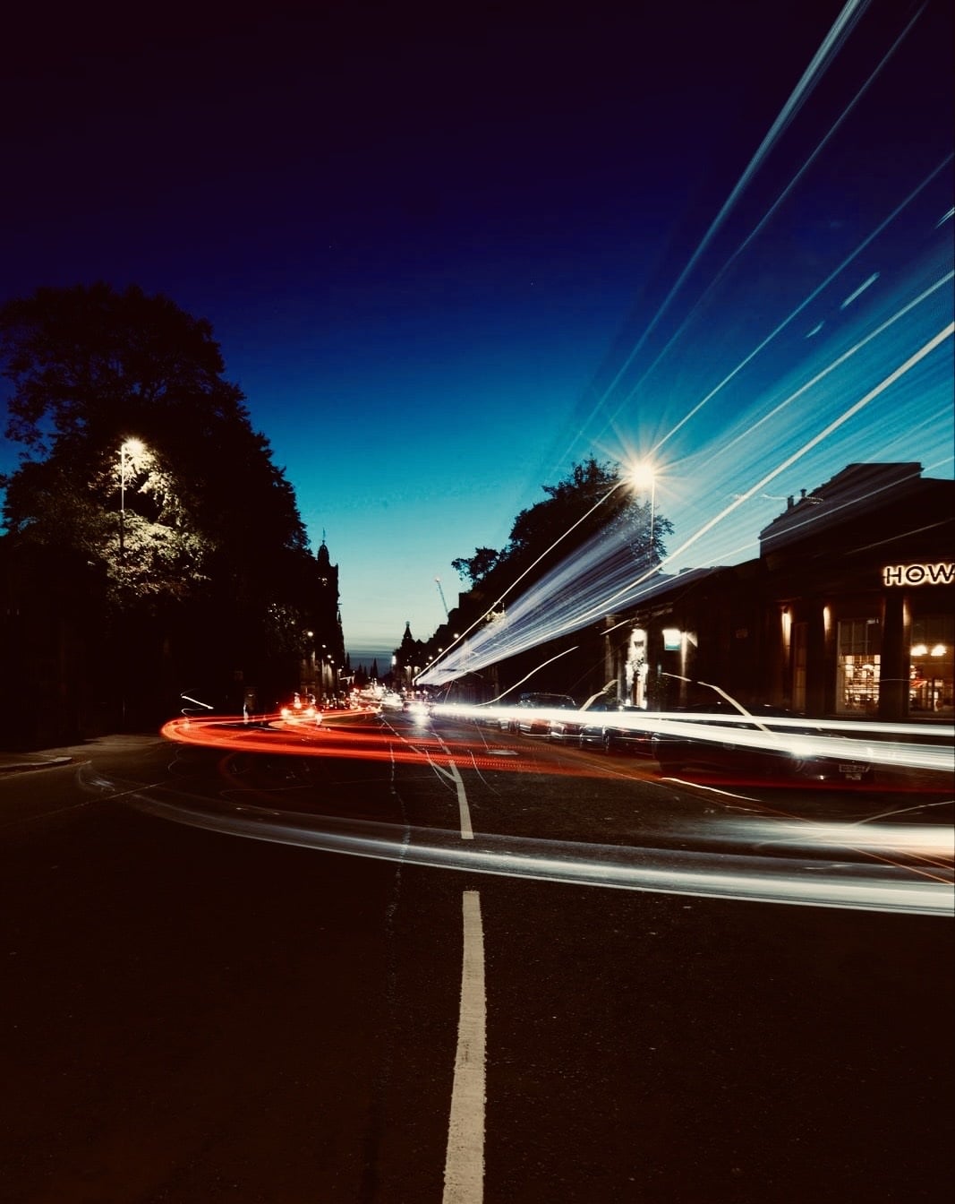 Long-exposure light trails photographed on an Edinburgh street