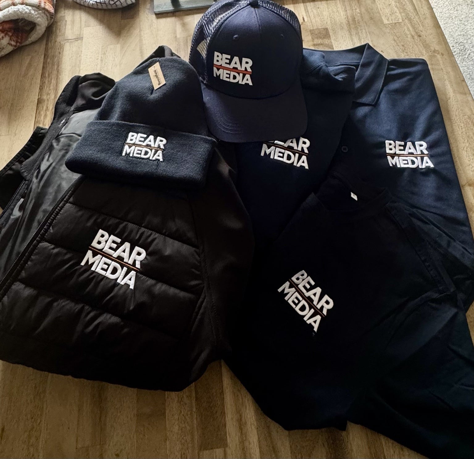 Bear Media branded clothing prepared for client content work
