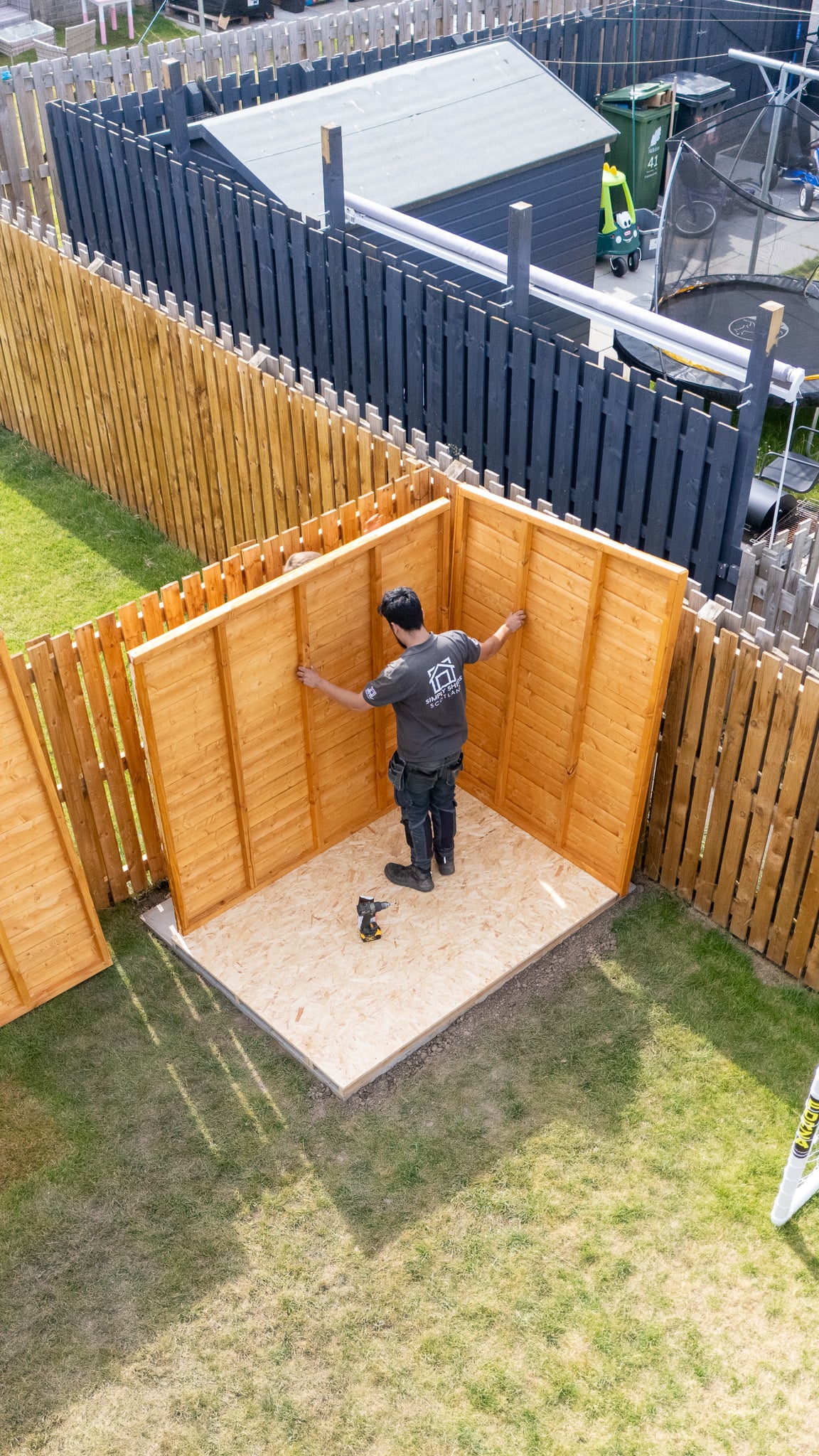 Aerial view of the Simply Sheds Scotland team installing a garden building