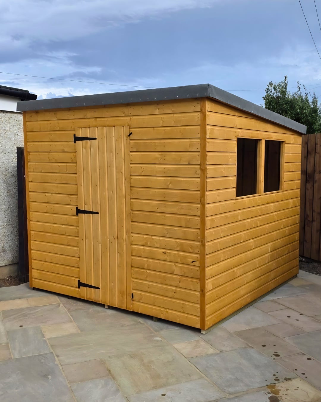 Recent pent shed with a side window by Simply Sheds Scotland