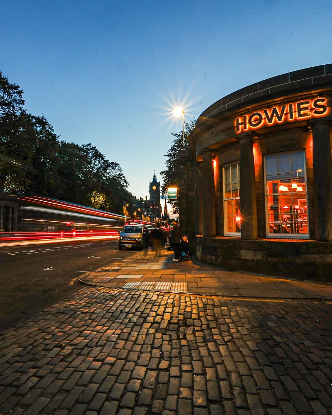 Night street photography with light trails outside Howies